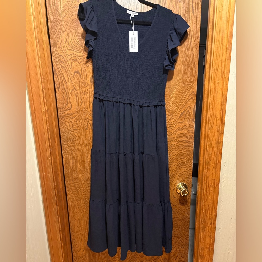 Baltic born smocked navy dress
